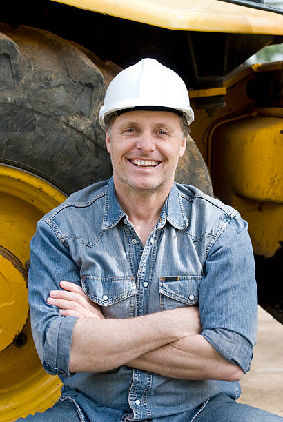 smiling constrction worker stock photo