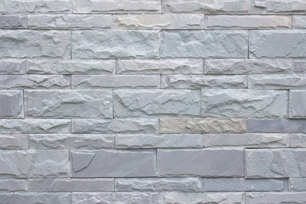 istock Gray wall texture background. Stone grunge brick wall background 978795260