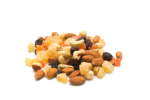 istock Nuts and dried fruits on isolated 97879611