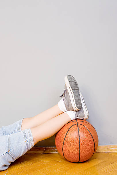 istock Little boy resting on basketball 97882173