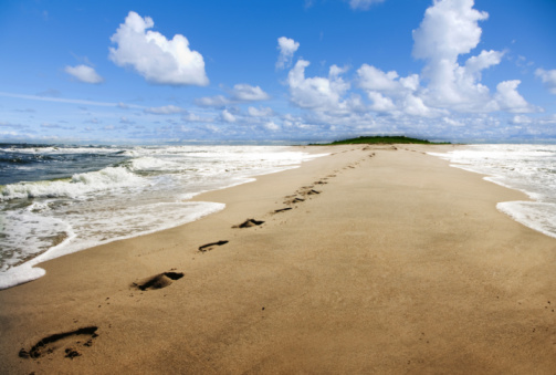 Footprints on sand at the seaside in Turkey.