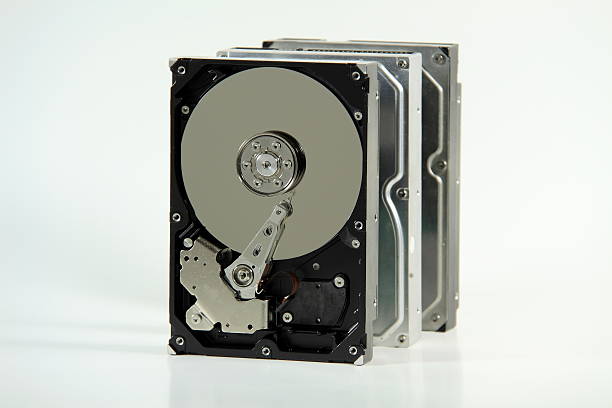 istock Storage Progression - Hard Drives Stacked like Dominoes 97886365
