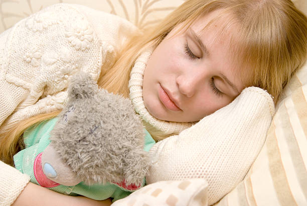 istock Young Girl Sleeps 97887420