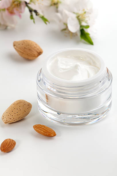 istock Face cream and almond flowers 97889702