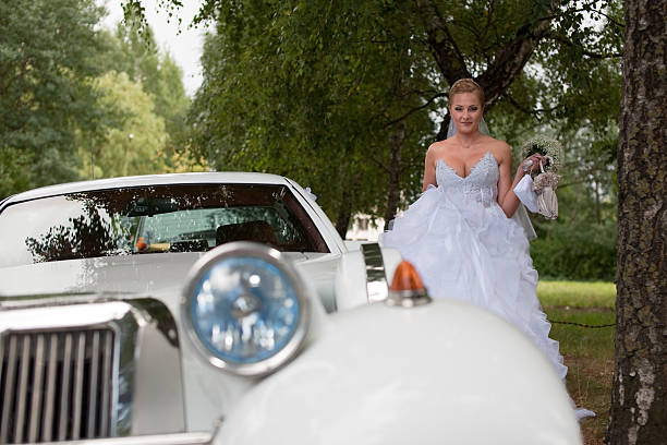 istock Bride near vintage retro car before wedding ceremony 97889802