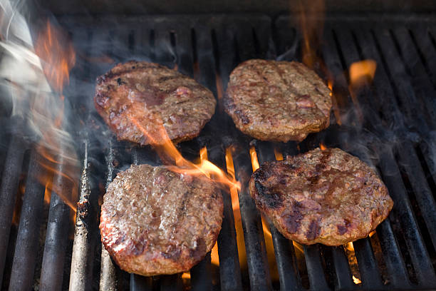 istock Hamburgers on the Grill 97890114