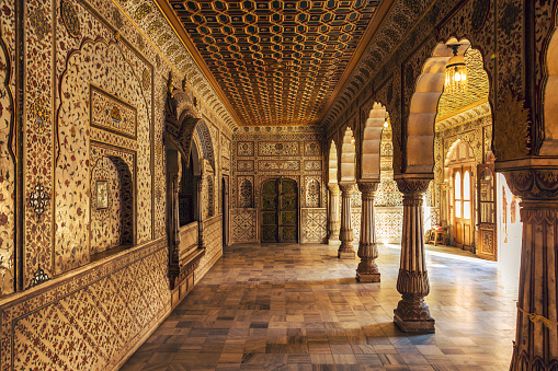 Junagarh Fort Bikaner Rajasthan - Interior gold artwork with architecture details.