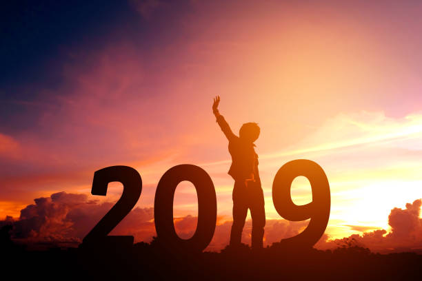 istock Silhouette young man happy to 2019 new year 978902346