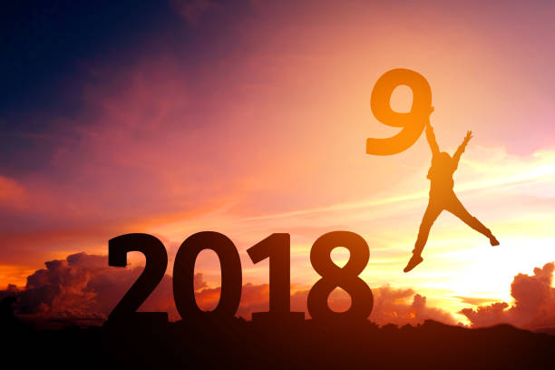 istock Silhouette young man happy to 2019 new year 978902348