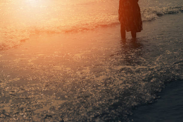 istock Girl standing at the sea. 978910574