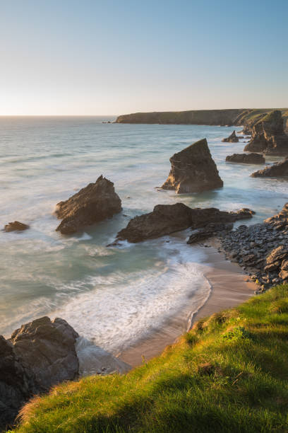 istock Stunning dusk sunset landscape image of Bedruthan Steps on West Cornwall coast in England 978918070