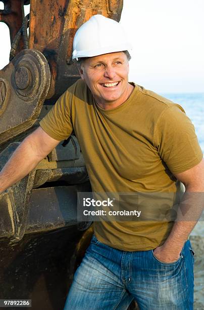 Happy Smiling Consruction Worker Stock Photo - Download Image Now - 40-44 Years, 40-49 Years, Adult