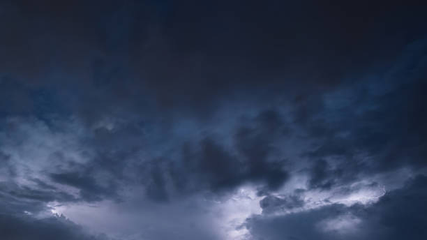 istock Powerful lightning storm raging in moody dramatic sky 978925088