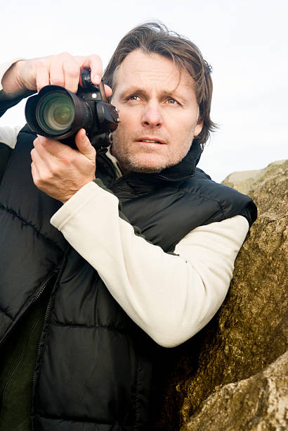 istock Male photographer 97892526