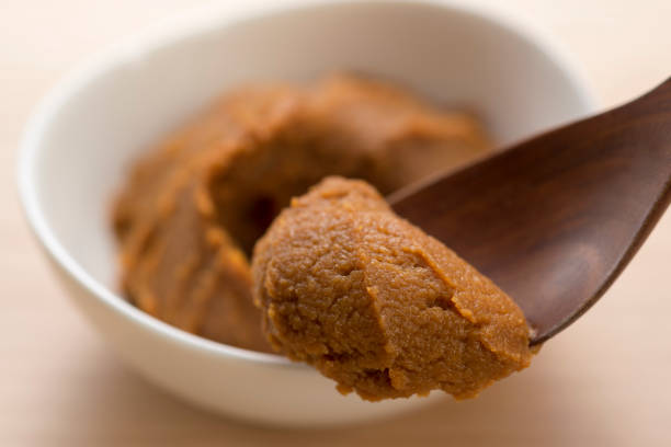 Miso is a traditional Japanese seasoning produced by soybeans. Miso is a traditional Japanese seasoning produced by soybeans. miso sauce stock pictures, royalty-free photos & images