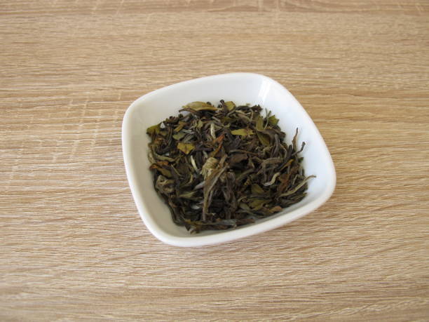 istock White tea Darjeeling from North India on wooden board 978958424