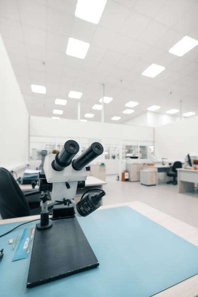 istock Industrial optical microscope. Workplace for quality control of electronic circuit boards 978966140