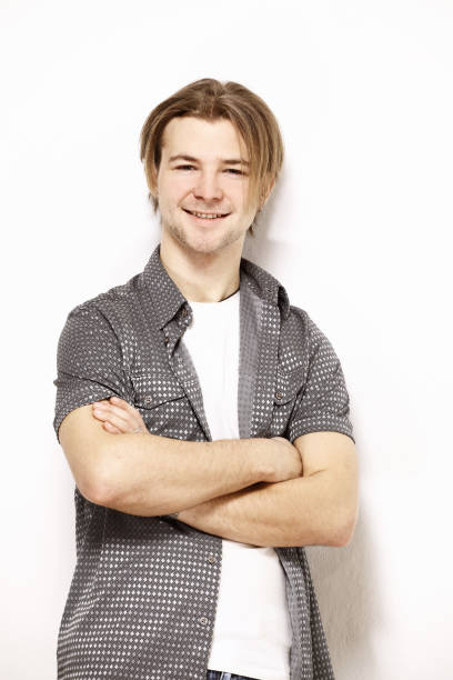 istock stylish smiling guy in the fancy shirt 978969136