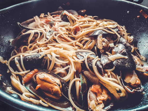 istock Mussels with pasta are cooked in a frying pan 978969140