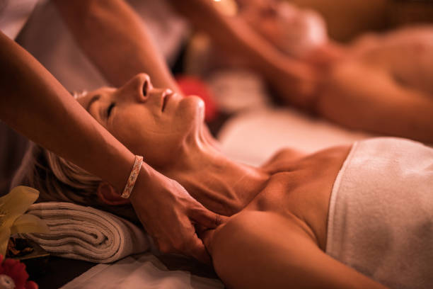 istock Massaging senior woman at the spa! 978974236