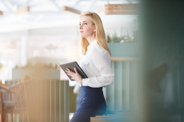 istock Beautiful young woman working in morning time 978974636