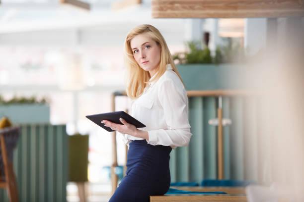 istock Beautiful young woman working in morning time 978974846