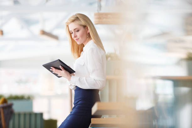 istock Beautiful young woman working in morning time 978975212