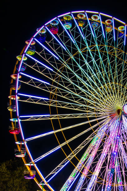 istock Big ferry wheel in the park by night 978975430