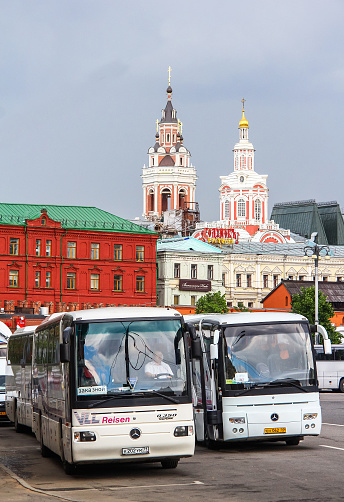Moscow, Russia - June 2, 2013: Touristic coach buses Mercedes-Benz Turk O350RHD Tourismo in the city street.