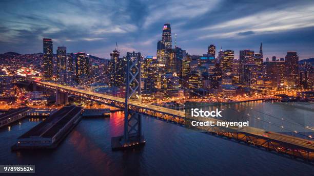 Aerial Cityscape View Of San Francisco And The Bay Bridge At Night Stock Photo - Download Image Now