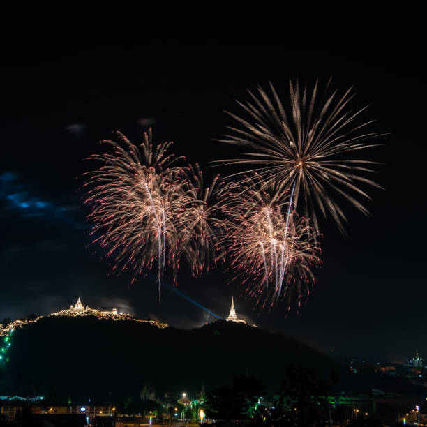 istock Beautiful fireworks display on dark sky for celebration night 978988418
