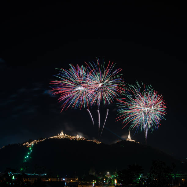 istock Beautiful fireworks display on dark sky for celebration night 978988422
