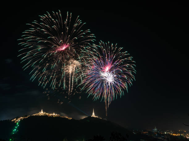 istock Beautiful fireworks display on dark sky for celebration night 978988444