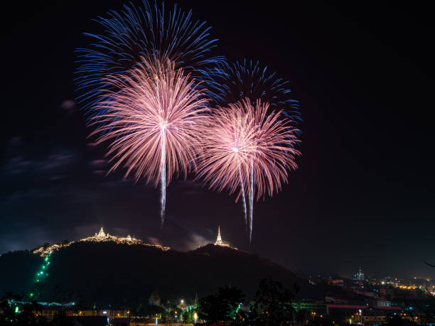 istock Beautiful fireworks display on dark sky for celebration night 978988446