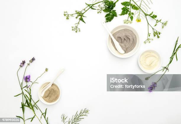 Natural Cosmetics Concept With Various Kinds Of Cosmetic Clays And Herbs Stock Photo - Download Image Now