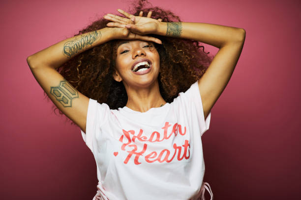 istock Beautiful young woman with afro, summer time. 979000004