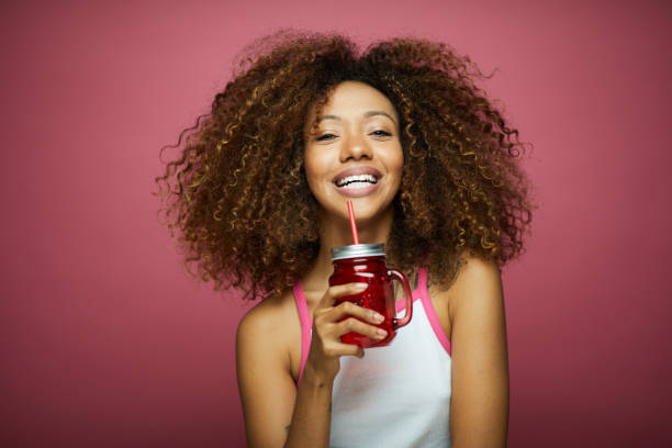 Beautiful young woman with afro hair in summer themes.Made in Barcelona with model from Venezuela.