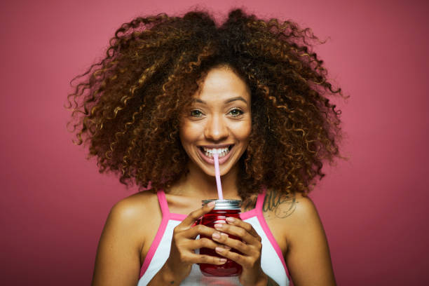 Beautiful young woman with afro hair in summer themes.\nMade in Barcelona with model from Venezuela.