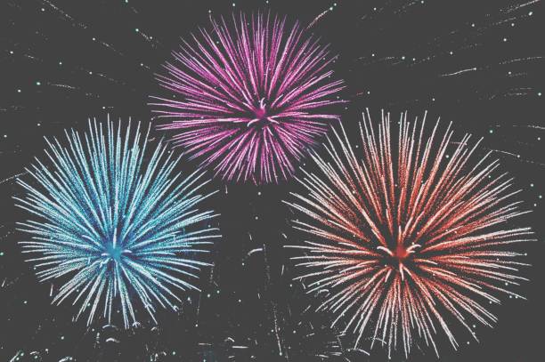 istock multicolored salutes in the night sky 979000318