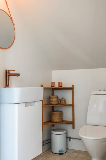 istock Modern small toilet room with copper details 979006364