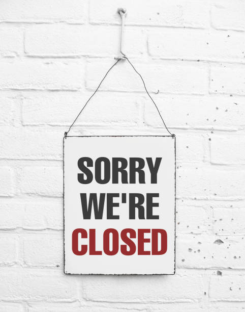 istock Sign text sorry we are closed board on the wall 979006444