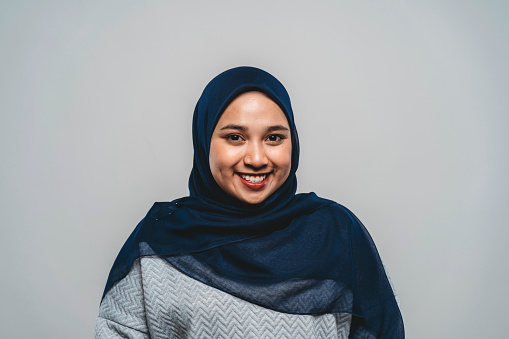 Portrait of a young adult malaysian woman. Studio shot
