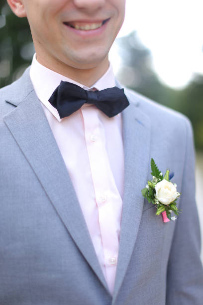 istock Happy young groom smiling and wearing grey shirt 979017356