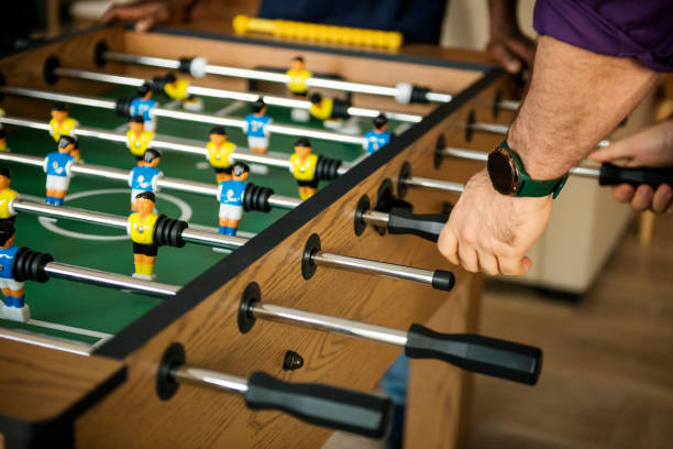 istock People playing table football 979020430