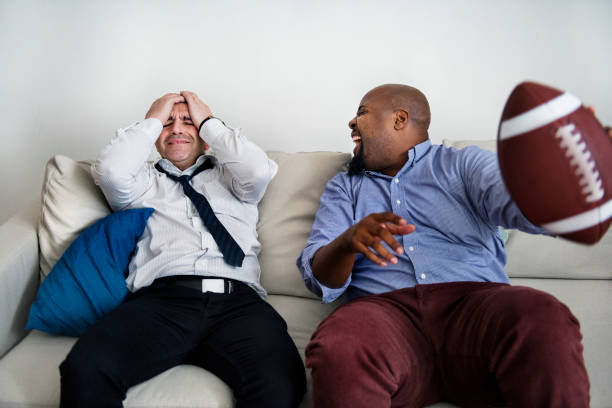 istock Friends cheering sport league together 979020488