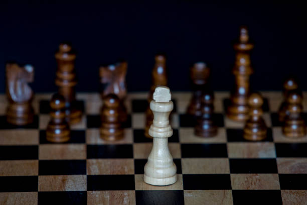 istock chess pieces with the king in the center 979027370