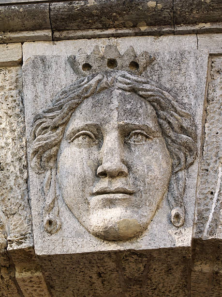 лицо на стене - renaissance baroque style sculpture human face стоковые фото и изображения