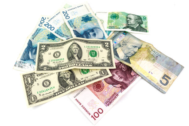 istock Multi currency banknotes with a men's wallet isolated 979030832