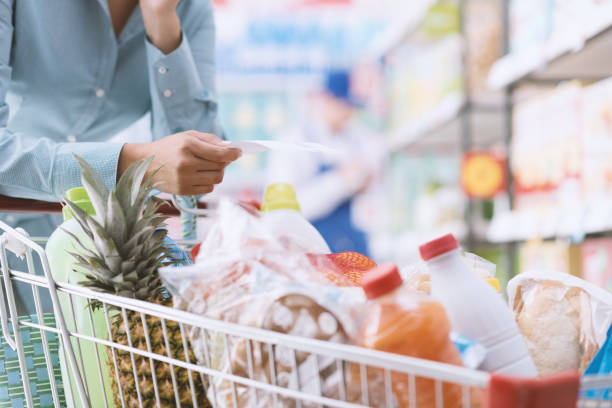 istock Woman checking a shopping list 979031620
