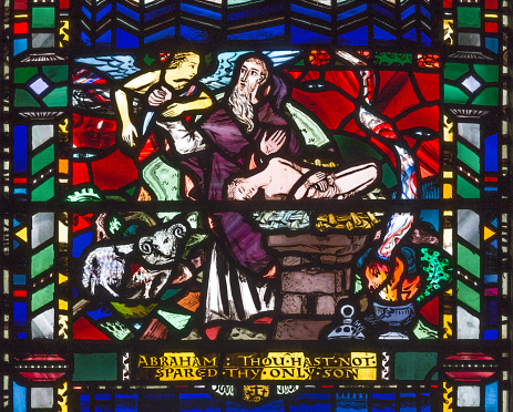 London - The stained glass of Abraham Offers Isaac on Mt. Moriah  in church St Etheldreda by Charles Blakeman (1953 - 1953).